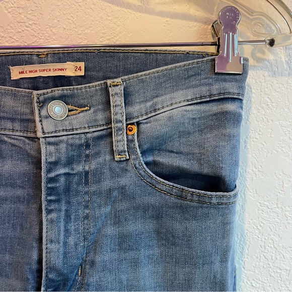 Levi’s Mile High Super Skinny Jeans with Holes and Frayed Bottoms - Picture 7 of 11